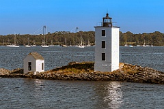 Dutch Island Lighthouse Tower with Bridge in Background